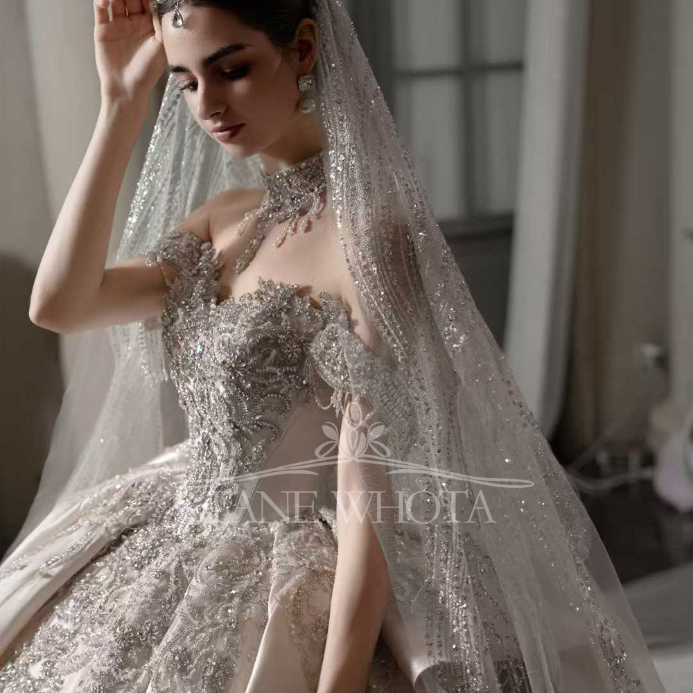 فستان زفاف فاخر مزين بالترتر ا - مراجعة Embroidery Roses وسعره